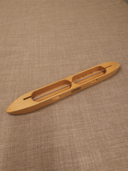 Vävskyttel för dubbelspolar