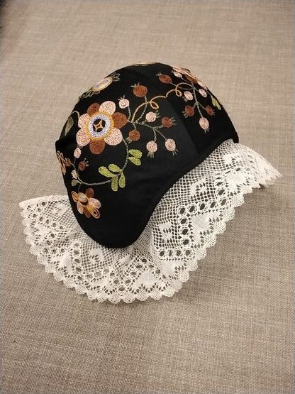 Bindemössa Skedevidräkten